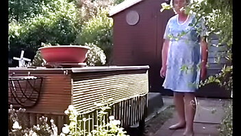 Dressed unknown, outdoors garden, crossdresser seduces boy, exposing dress, porno bimbo
